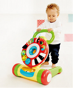Baby walking with a colourful push frame