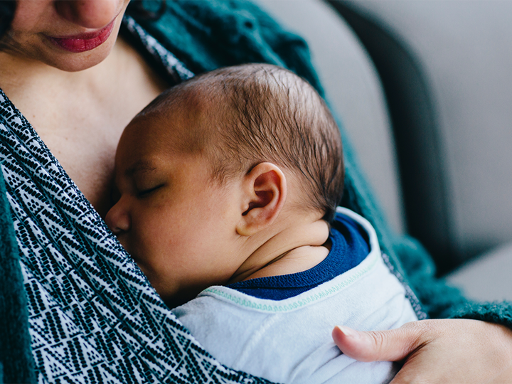 Close Up Of Mother With Sleeping Son 1